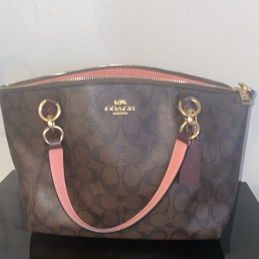 $60 will include the Coach card holder I have listed as well. No negotiation.